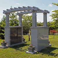 Harmony Hill garden cremation trellis feature facing lake.